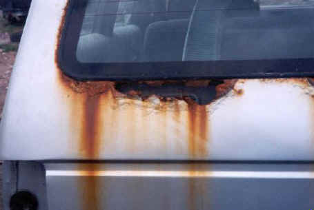 Sand trapped behind trim can wear away the protective paint coating and expose the steel to the environment and subsequent severe corrosion damage